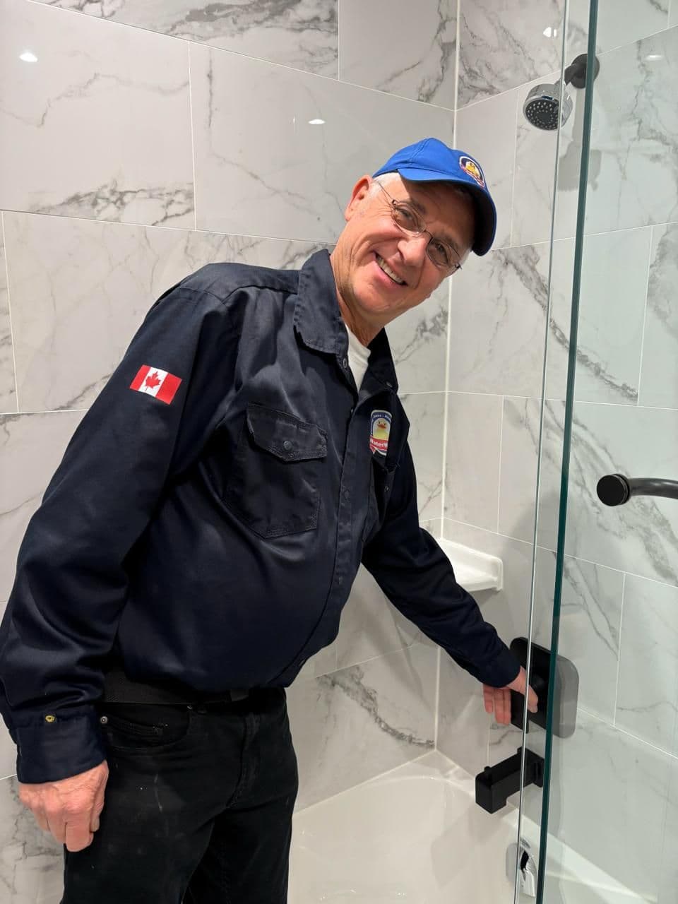 Michael from Waterworks in a finished shower